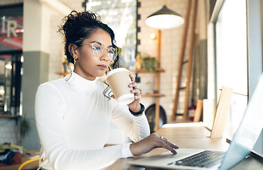 Image showing Laptop, coffee shop and remote work with a digital marketing woman in a restaurant for research. Computer, small business and a young freelance employee thinking in a cafe as a startup worker