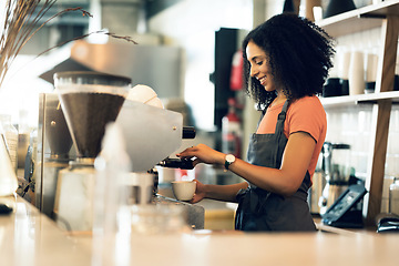 Image showing Happy woman, barista and small business owner at cafe for service, coffee or beverage by counter at store. Female person, employee or waiter making espresso, cappuccino or latte at restaurant or shop