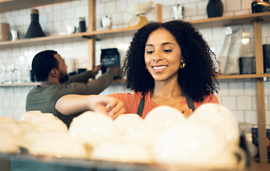 Image showing Happy woman, barista and coffee at cafe for drink, beverage or breakfast at retail store or shop. Female person, employee or waiter smile for tea, preparation or service on counter at restaurant