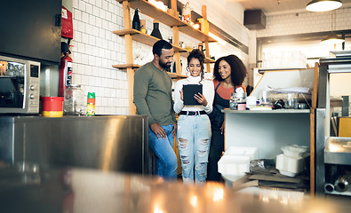 Image showing Happy woman, tablet and team in cafe for manager, meeting or planning together at coffee shop. Female person, entrepreneur or restaurant owner smile in teamwork on technology at retail store