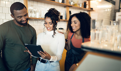 Image showing Happy woman, tablet and team in small business cafe for inventory, meeting or planning at coffee shop. Female person, entrepreneur or restaurant owner smile in teamwork on technology at retail store