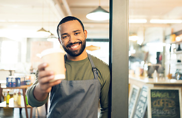 Image showing Portrait, happy man or barista with smile for coffee cup in hand for customer. African, person or employee of small business with order of cappuccino, latte or drink in store, cafe or shop for offer