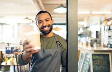 Image showing Coffee cup, portrait and man in cafe offer drink, warm beverage and catering for hospitality services. Happy restaurant manager, barista and waiter giving take away latte, hot cappuccino and espresso