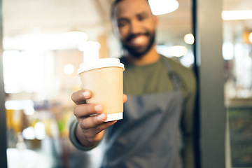 Image showing Coffee cup, hands and waiter in cafe offer drink, warm beverage and catering for hospitality services in startup. Closeup, restaurant barista and shop owner giving take away order of hot cappuccino
