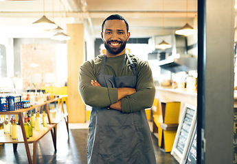 Image showing Happy man, portrait and small business owner of cafe with arms crossed in confidence or retail management. Male person, barista or waiter smile by entrance of coffee shop, store or ready for service