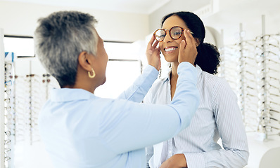 Image showing Optometry, glasses and women consulting for decision, choice and eye care option in optician store. Healthcare, ophthalmology and people in clinic for prescription lens, spectacles and vision frames