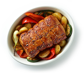 Image showing whole roast pork and vegetables