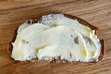 Image showing rye bread with butter