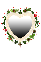 Image showing Christmas Heart Shape Wreath Holly and Festive Winter Greenery