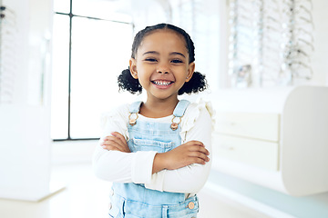 Image showing Optometry store, arms crossed and portrait of happy child shopping for eyeglasses, optical clinic product or youth eyewear. Prescription lens frame, ocular eye care and young kid customer for glasses