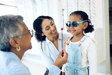 Image showing Optometry, eye test and optometrist with child and mother at an ophthalmology appointment. Medical, wellness and senior optician with young mom and girl kid patient with lenses in an optical clinic.