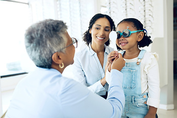 Image showing Eye exam, optometry and child with senior woman optometrist at clinic for vision check. Eyesight, glasses and kid consulting old lady ophthalmologist for optics, analysis or prescription spectacles