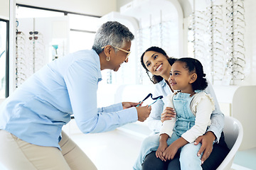 Image showing Optometrist, kid and glasses for eye care, vision or consultation in medical office for lens. Woman, girl and family for support, trust and wellness for appointment, optometry or treatment for health
