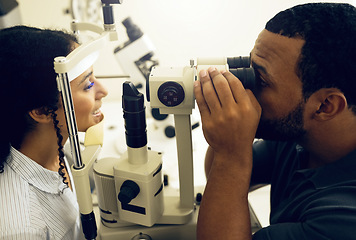 Image showing Eye test, machine and a woman with a doctor for a service, vision problem and surgery on lens. Happy, clinic and a patient with a man or optometrist for a medical exam, retina health and check