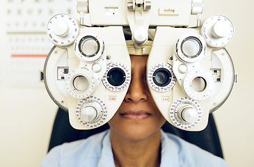 Image showing Eye test, face or woman consulting to help eyesight at optometrist for a optical assessment. Optometry, wellness or customer in clinic for vision, iris or retina health with machine or phoropter
