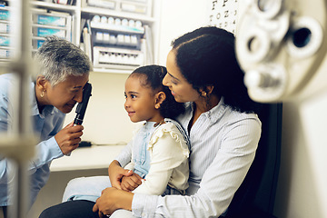 Image showing Optometry, consultation and optometrist with child and mother at eye care appointment for test. Vision, medical and senior optician with young mom and girl kid patient with lenses in optical clinic.