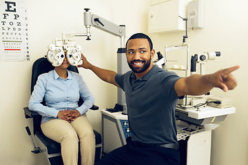 Image showing Woman, eye exam and phoropter with ophthalmologist, test and check with lens, vision and wellness in clinic. Doctor, eyesight tools and machine for assessment, consultation or healthcare in hospital