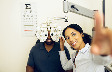Image showing Woman, optometrist or optical equipment for eye testing, optometry or doctor for exam, assessment or vision. Healthcare, man or eyesight in consult, glasses and clinic for checkup, diagnosis or job