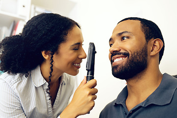 Image showing Patient, eye exam and test in clinic with ophthalmoscope to check for glaucoma, ocular services or healthcare assessment. Happy optician, woman and retina analysis for eyesight of man with lens tools