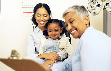 Image showing Optometrist, mother and kid for eye exam, doctor and health insurance paperwork, help in eyecare. Wellness, contract or agreement for vision, assessment and women with girl in clinic for optometry