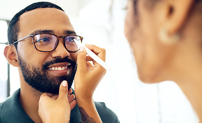 Image showing Vision, glasses and eye test with a man at the optometrist for a prescription frame lens assessment. Face, smile and eyewear with a customer talking to a consultant at the optician for assistance