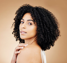 Image showing Studio portrait, beauty and face of woman with skin wellness treatment, dermatology or makeup shine, glow or self care. Cosmetology, natural facial cosmetics and skincare model on brown background