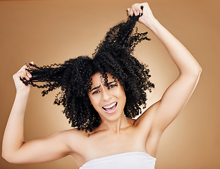 Image showing Afro woman, hair problem and studio portrait of grooming care mistake, shampoo allergic reaction and frustrated with hairloss. Hairstyle disaster, frizz and face of person stress on brown background