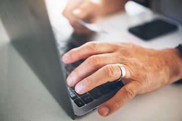 Image showing Hand, laptop and online shopping closeup with a person in their home for ecommerce payment or retail. Bank, finance or accounting with an adult planning for retirement on the internet as a pensioner