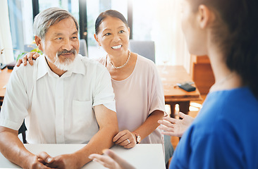 Image showing Happy, senior couple and consultation with doctor in office for rehabilitation, results and update on health care. Nurse, talking and elderly patient listen to news for medical wellness or advice