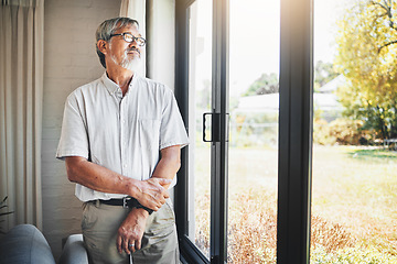 Image showing Thinking, window and senior man at his home with memory, reflection or remember facial expression. Lonely, mental health and sad elderly male person in retirement by glass door in modern house.