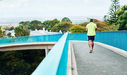 Image showing Back view, running or man on bridge on fitness journey or adventure for freedom, training or workout. Travel, holiday vacation or person on outdoor activity for cardio exercise or wellness in Peru