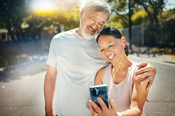 Image showing Couple, smile and break from run for social media, meme and funny joke in street, humor and comedy. Happy senior people, retirement and fitness for health, laughing and earphones for smartphone