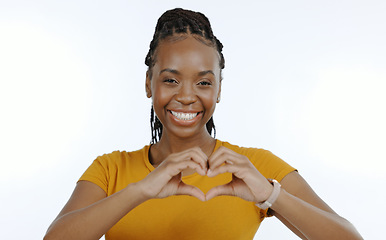 Image showing Woman, portrait and hands with heart emoji for love, support and happiness on white background in studio. Black person, smile and hand gesture for care or kindness, trust and motivation in closeup