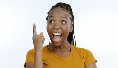 Image showing Hand, idea and aha with an excited black woman in studio on a white background for a eureka moment. Face, wow and finger with a happy young person looking surprised by a solution or conclusion