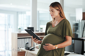 Image showing Tablet, happy and pregnant business woman in office reading research information on internet. Maternity, smile and female designer from Canada with pregnancy work on digital technology in workplace.