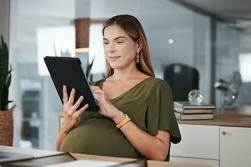 Image showing Tablet, networking or pregnant business woman in office on social media, website or internet at desk. Maternity, communication or female designer with pregnancy or technology to scroll in workplace