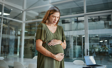 Image showing Pregnancy, pain and business woman in office with contractions or muscle tension in startup company. Pregnant, discomfort and professional touch abdomen, strain and fatigue of mother in workplace