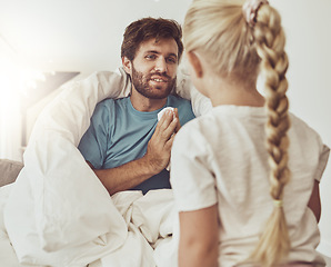 Image showing Sick father, tissue and child in home living room, talking and care for family. Girl, kid and help dad with flu, allergy or covid on lounge in blanket in winter for disease, cold virus and bacteria