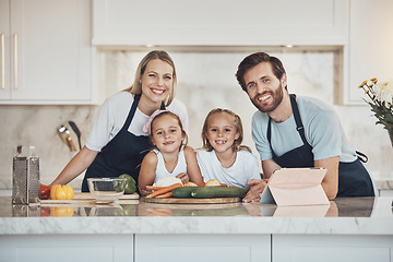 Image showing Smile, portrait and family cooking in kitchen together for bonding and preparing dinner, lunch or supper. Happy, love and girl children with vegetables or ingredients with parents for meal at home.