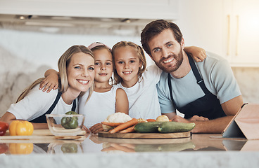 Image showing Love, portrait and family cooking in kitchen together for bonding and preparing dinner, lunch or supper. Happy, smile and girl children and parents with vegetables or ingredients for meal at home.