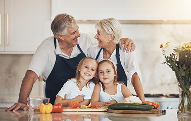 Image showing Happy family, love and grandparents with grandchildren cooking in a kitchen with vegetables. Food, learning and kids with old people at home for nutrition, fun and bond while preparing organic meal