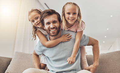 Image showing Portrait, piggyback and girl kids with father on a sofa smile, bond and playing in their home together. Love, happy family and excited children hug parent in a living room with care, support and fun