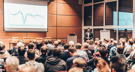 Image showing Business speaker giving a talk in conference hall.