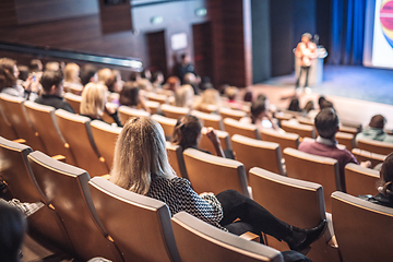 Image showing Woman giving presentation on business conference event.