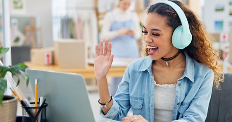 Image showing Video call, wave and woman in small business on laptop with customer or virtual communication in fashion studio. Entrepreneur, talking or crm service, online meeting and chat with ecommerce clients