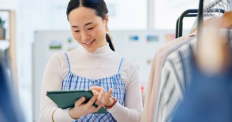 Image showing Fashion, small business and Asian woman with a tablet, store and retail with ecommerce, connection and search internet. Person, shop assistant and worker with technology, boutique and online shopping