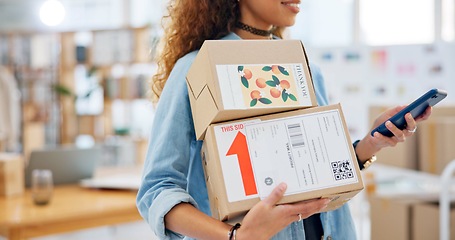 Image showing Package, startup and closeup of woman with phone for business at a fashion retail boutique. Networking, technology and female entrepreneur with cardboard boxes and cellphone for delivery information.