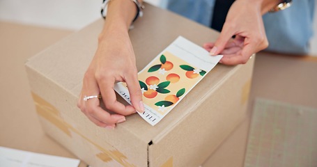 Image showing Online order, label sticker and woman hand with small business in fashion with delivery and cardboard box. Stock, startup and sales of ecommerce and boutique at home of a entrepreneur with package