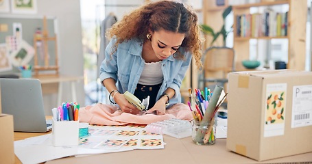 Image showing Small business, clothes and a woman packing an order or logistics for fashion delivery in store. Young entrepreneur person or startup company owner for e commerce, parcel or packaging of product