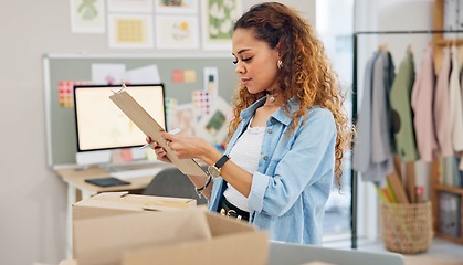 Image showing Online order, label check and woman with small business in fashion with delivery and cardboard box. Stock, startup and sales of ecommerce and web boutique at home of a entrepreneur with checklist